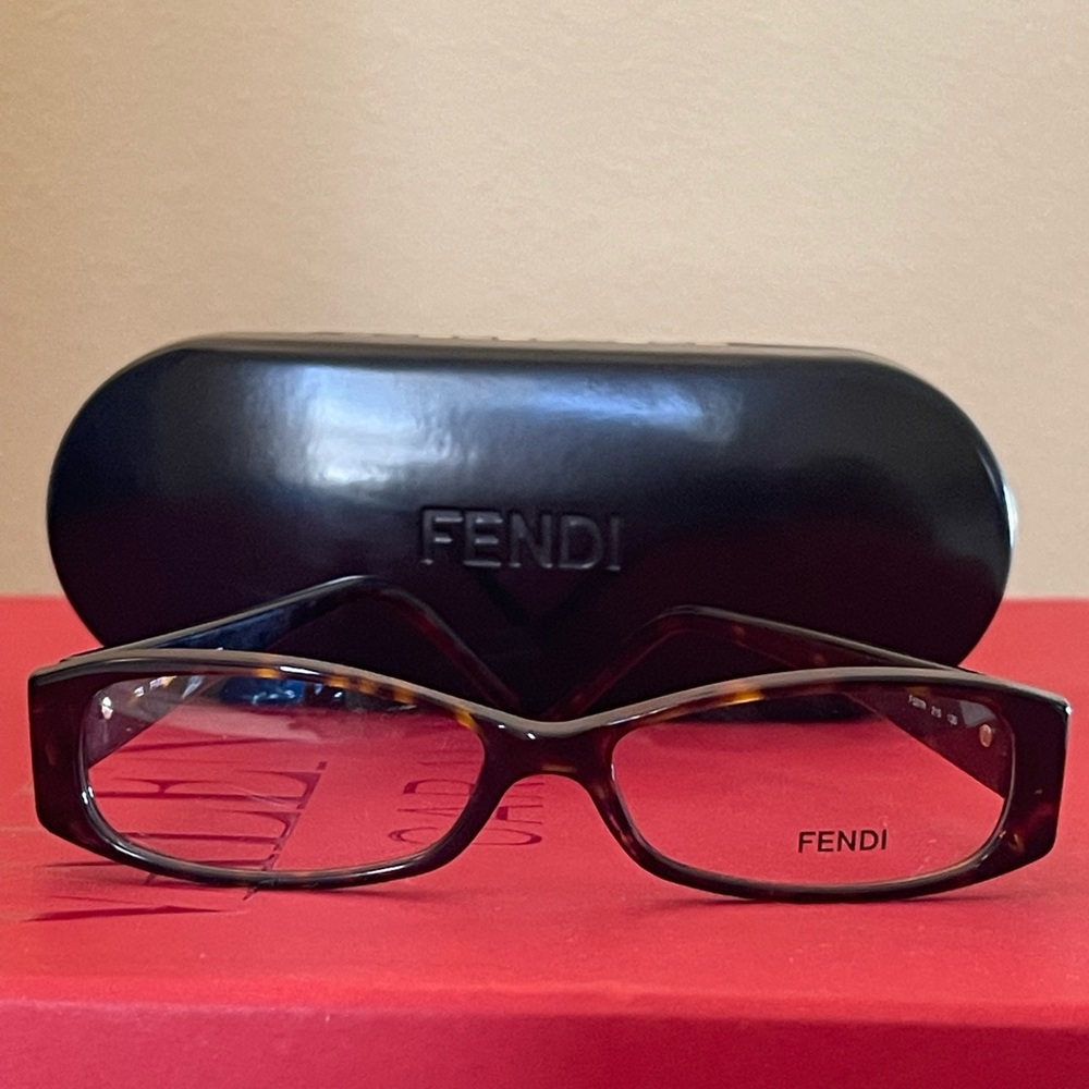 100% authentic Fendi reading glasses. Comes with case and authenticity cards.